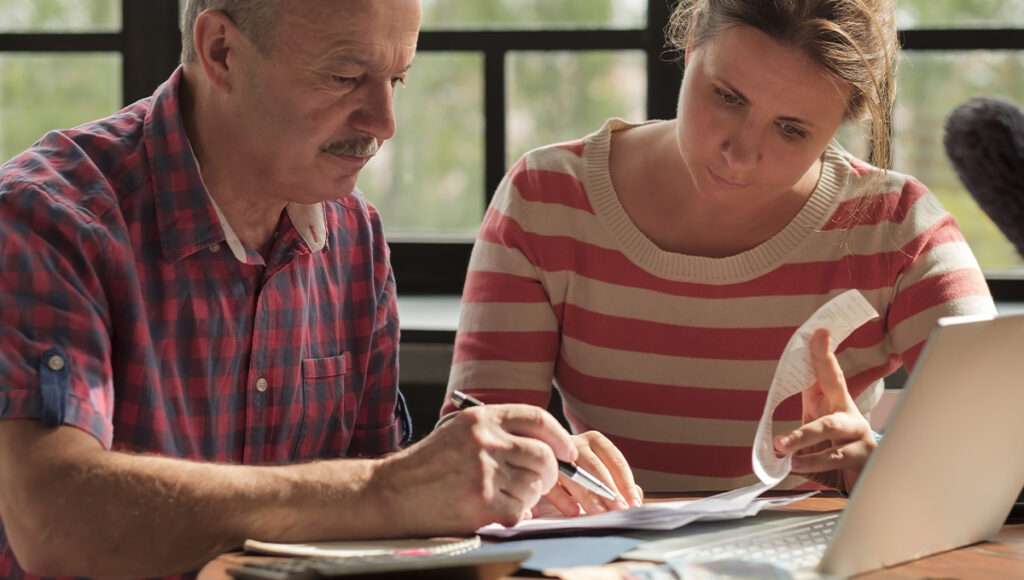 Two people discussing finances