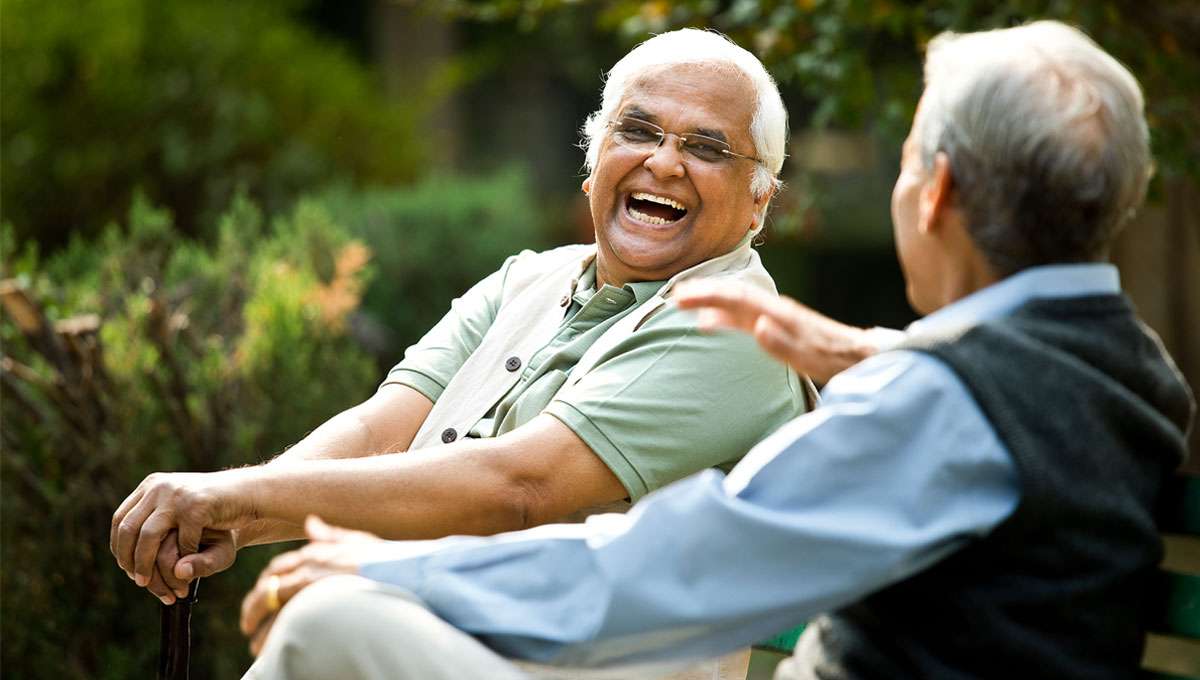 Two male friends laughing